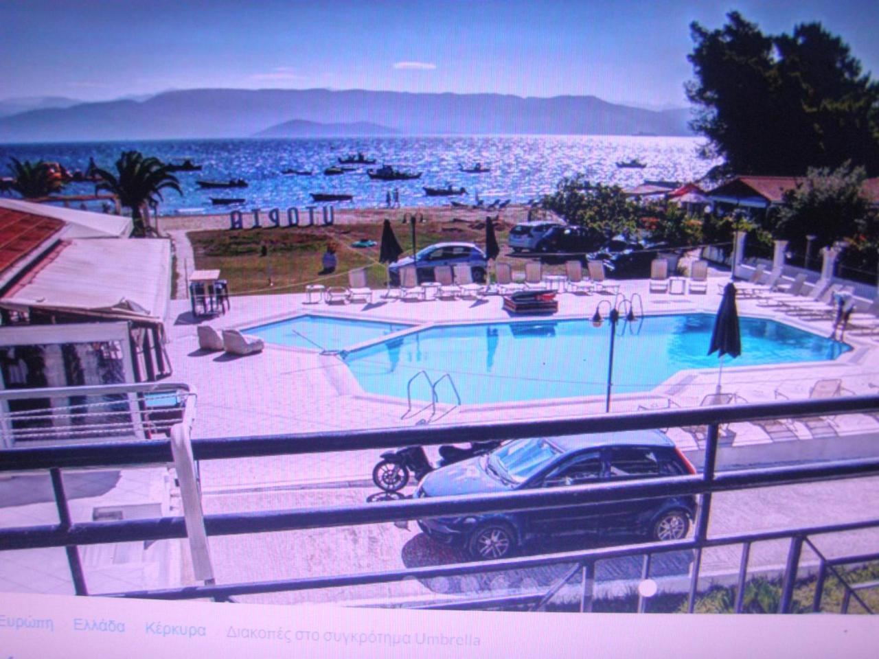 Umbrella Beach Apartments Kavos Bagian luar foto