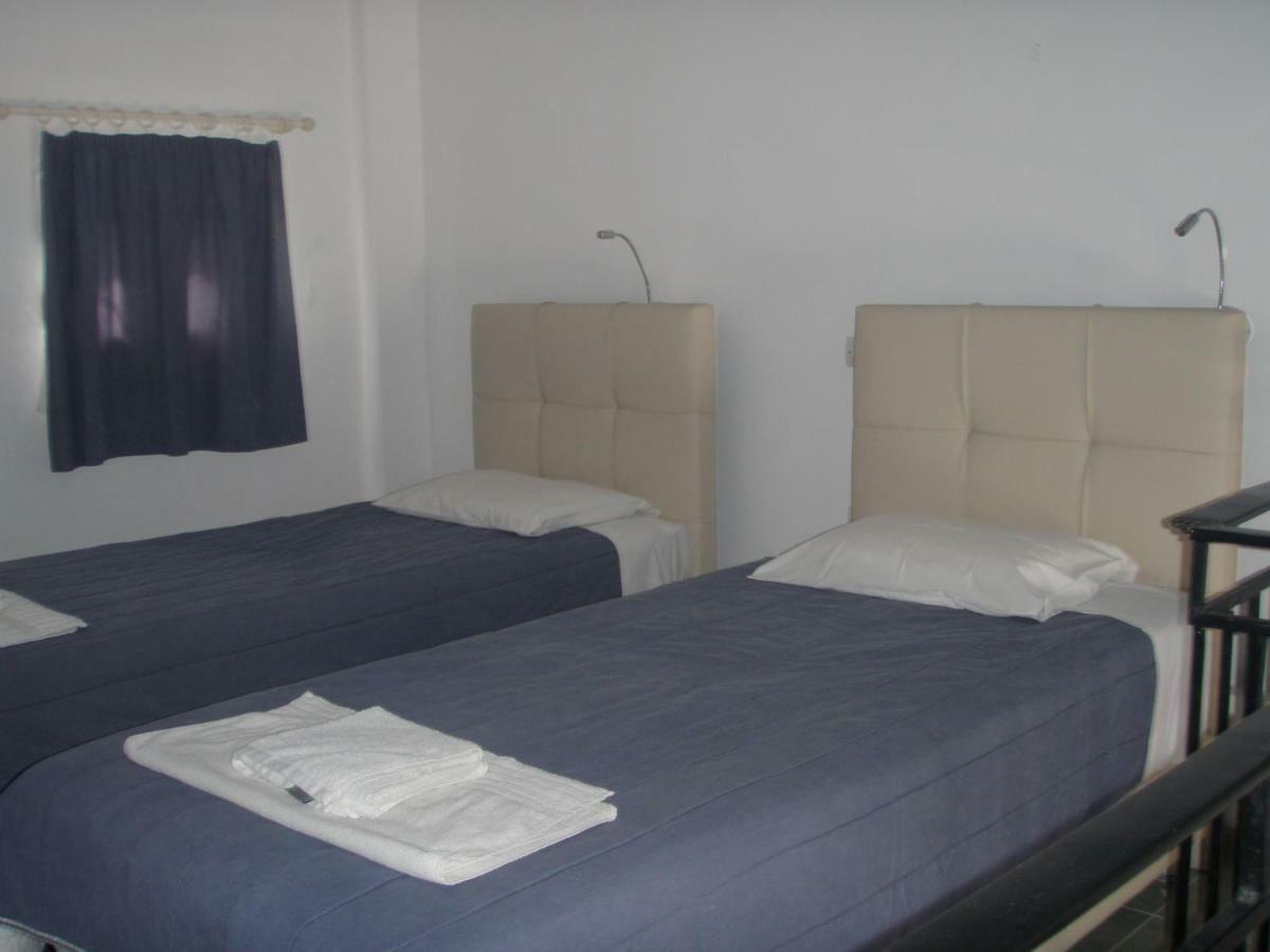 Umbrella Beach Apartments Kavos Bagian luar foto