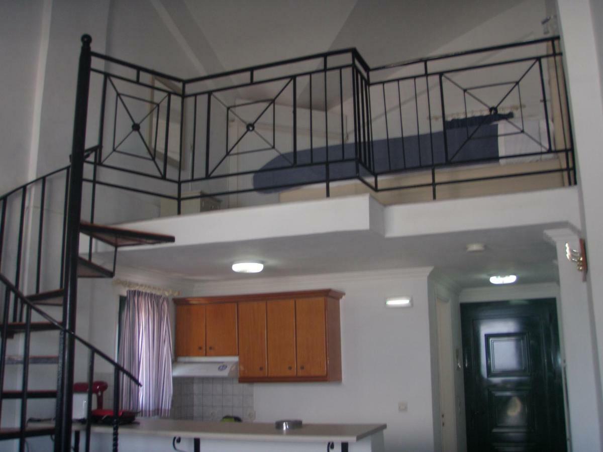 Umbrella Beach Apartments Kavos Bagian luar foto