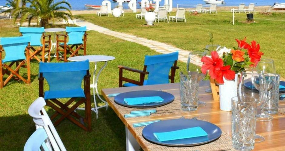 Umbrella Beach Apartments Kavos Bagian luar foto